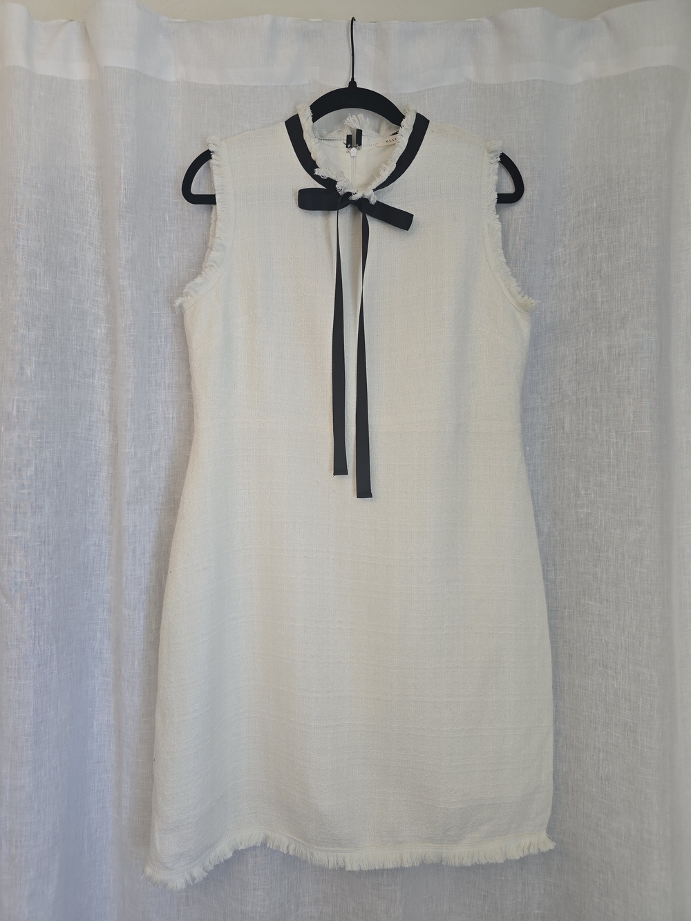 Ellison Sleeveless Cream Shift Dress with Black Ribbon Neck